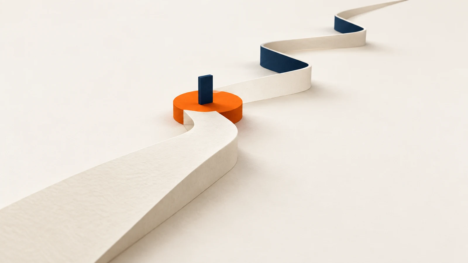 A cream paper path reaches an orange platform with a navy marker, then continues through bends beyond the first milestone.